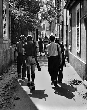 These Free French guerrilla fighters agreed to be photographed with their backs to the camera to protect their family members from German reprisals. The guerrillas played a much larger role in the Allied invasion of Southern France than in the Normandy invasion, which had occurred a few weeks earlier.