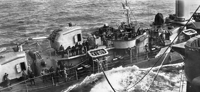 ABOVE: Commander Leonard Bailey was the USS Murphy’s first commander. TOP: Distinguished by a pair of funnels and two forward 5-inch gun mounts, the Benson-class destroyer USS Murphy is shown at sea in April 1944. 