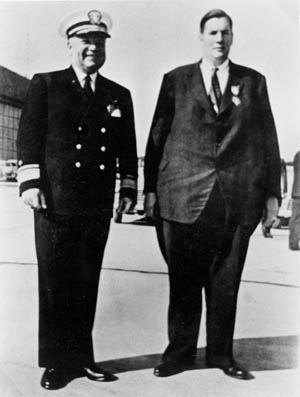 Donald Roebling, the wealthy inventor of the amphibious vehicle that became the primary landing craft of American forces during the war in the Pacific, stands with Admiral Ralph E. Davidson following the ceremony during which Roebling received the Medal of Merit in 1946.