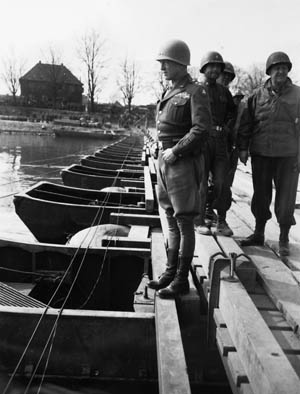 General Patton celebrates crossing the Rhine River by relieving himself in it. "The pause that refreshes," he called it.