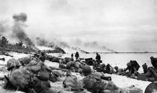 Marines land on “Orange One” beach during the Battle of Peleliu. Minutes later, the relative calm would be broken and the Marines would meet fanatical Japanese resistance.