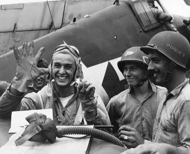 Lieutenant Alexander Vraciu celebrates six air-to-air victories during a single day of combat in the Great Marianas Turkey Shoot. A pilot of USS Lexington’s VF-16 squadron, Vraciu finished the war with 19 confirmed aerial victories.