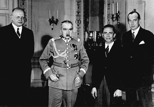 Following a lecture by Nazi Propaganda Minister Josef Goebbels in 1934, Polish Marshal Jozef Pilsudski posed with German dignitaries. Shown left to right are: Hans-Adolf von Moltke, German ambassador to Poland, Pilsudski, Goebbels, and Polish Foreign Minister Jozef Beck. 