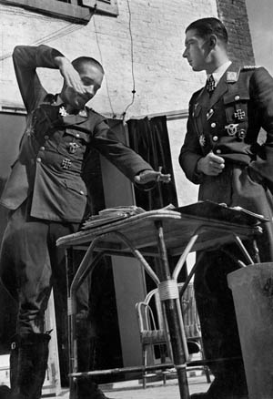 ADOLF GALLAND (1912-1996). German Luftwaffe General and fighter pilot. Photographed with Major Werner Mˆlders. Photograph, 1940.