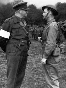 Lt. Col. Charles Vaughn, head of the British Commando training, converses with Maj. William Derby of the US Army Rangers in July 1942.