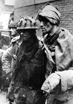 Battered survivors of the disaster at Arnhem, these British paratroopers surrendered to the Germans after being cut off and fighting heroically during Operation Market-Garden.