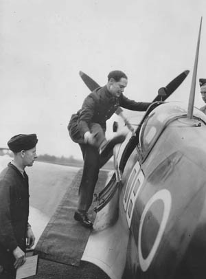 Bader swings one of his prosthetic legs into the cockpit of a Supermarine Spitfire fighter in September 1945. After being liberated from a German prison, Bader returned to duty and led a flight of Spitfires from North Weald Airfield in a flyover of London commemorating the fifth anniversary of the Battle of Britain.