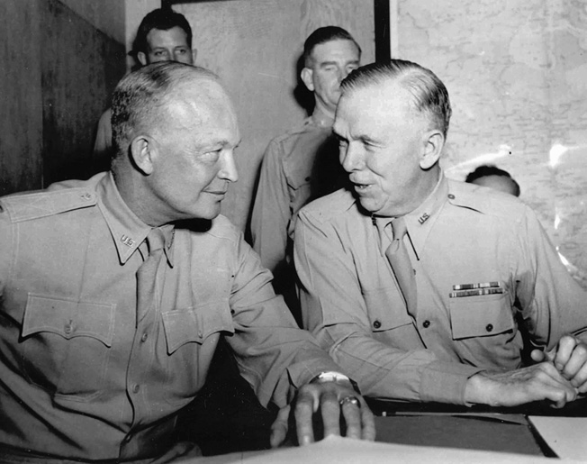 At Allied headquarters in North Africa in June 1943, Marshall (right) confers with General Dwight D. Eisenhower, Allied commander in the Mediterranean Theater. 