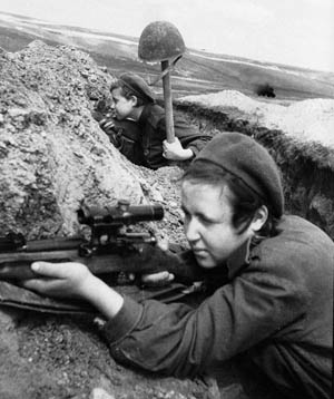 Using a helmet as a decoy, Soviet soldiers wait for Germans to fire and reveal their positions. In turn, these troops would hope to take the German snipers down with effective return fire.