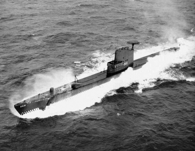 USS Rasher plows through the Pacific Ocean at flank speed in preparation for another war patrol.