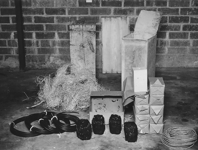 Crates containing TNT, coal bombs, and fuses recovered from the boxes buried by German saboteurs on Long Island.