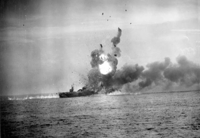 The escort carrier USS St. Lo was struck by a Japanese kamikaze suicide plane on the same day of the battle off Samar. The small carrier was wracked by explosions and later sank.