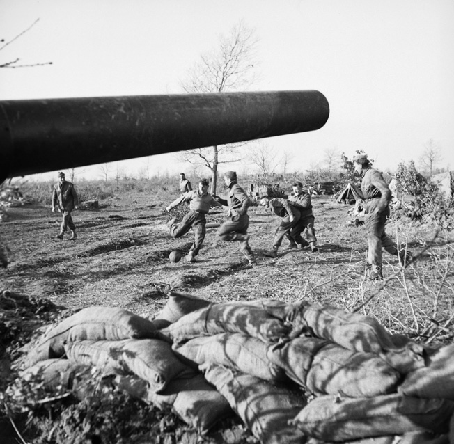 Taking time to play a game of soccer, or football as it’s referred to in Europe, these men of the British 80th Scottish Horse Medium Regiment are just behind the front lines of the hotly contested Anzio beachhead in Italy during the spring of 1944.