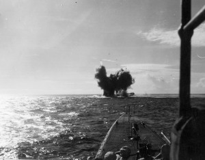 Torpedoes fired by the USS Cod slam into a Japanese merchant vessel. The enemy ship sank minutes later.