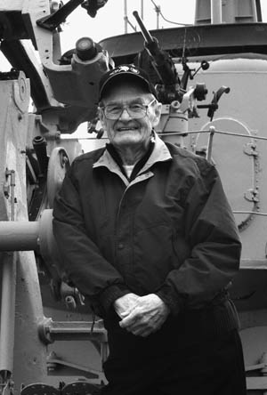 U.S. Navy veteran Robert Hunt poses aboard the submarine USS Cobia, which is on display as a floating exhibit at the Wisconsin Maritime Museum in Manitowoc. Hunt survived 12 combat patrols with the USS Tambor and recorded his impressions of war at sea in numerous letters.