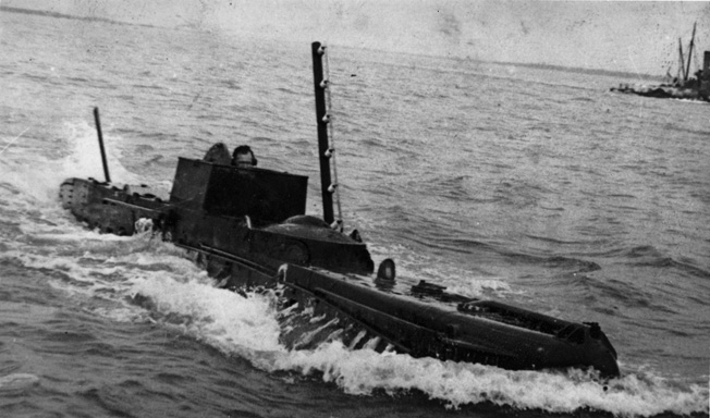 A prototype X-craft churns along during trials. Although it experienced some navigational and mechanical challenges, the midget submarine proved well suited for the attack on Tirpitz.