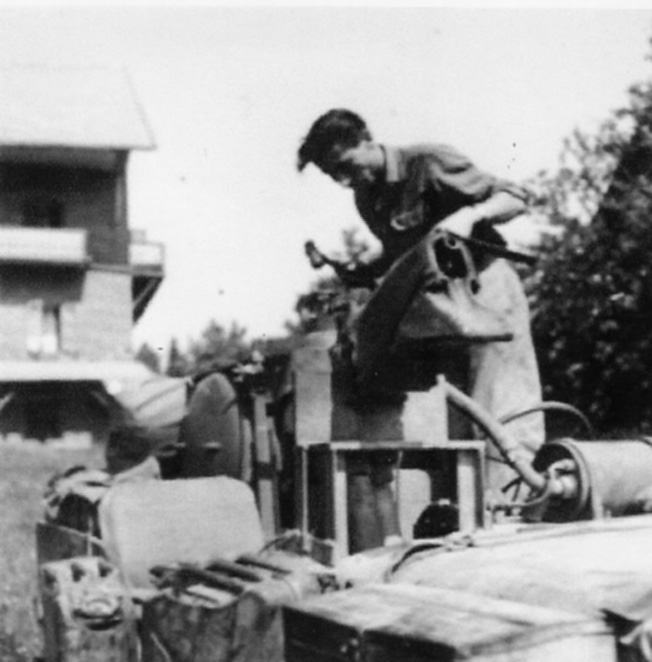 One of Popski’s lieutenants, Nick Hubbard, mounts a flamethrower atop a PPA jeep.