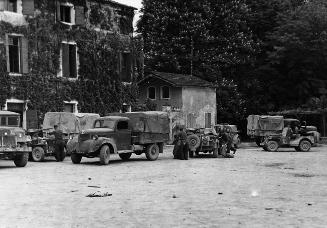 PPA vehicles are shown during a 48-hour rest and refit period on the campus of the University of Padua, Italy, in the spring of 1945.