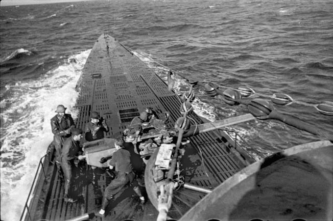 Reinhard Hardegan was one of several German U-boat commanders who terrorized the U.S. East Coast during Operation Drumbeat. In this photo crewmen of Hardegan’s U-123 engage the British freighter Culebra with their deck gun on January 25, 1941. The Culebra was sunk by the Germans, and the vessel’s crew was offloaded into lifeboats and given the proper course for Bermuda.