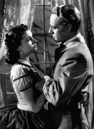 Howard, shown with Vivien Leigh, is best known for his portrayal of Ashley Wilkes in Gone with the Wind. 