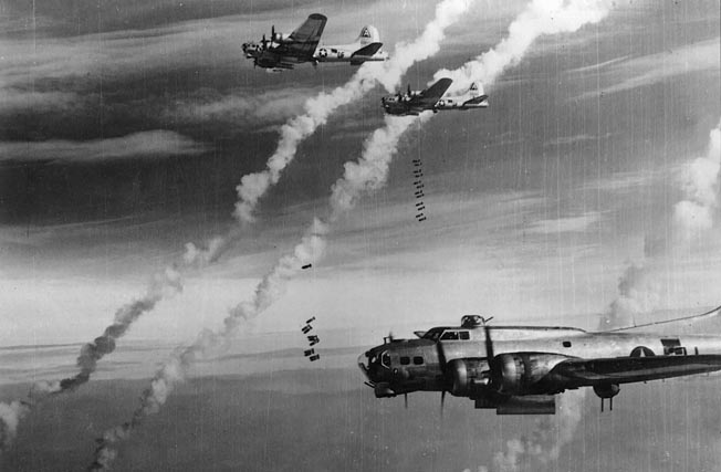 Bombs away over Germany. Flying in tight formations enabled the Flying Fortresses to defend themselves against fighters but also made them inviting targets for German pilots and flak gunners.