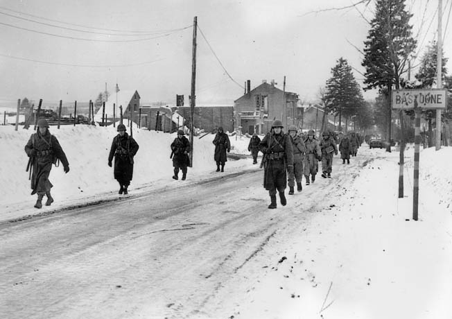 101st soldiers head to the front near Bastogne during the Battle of the Bulge.