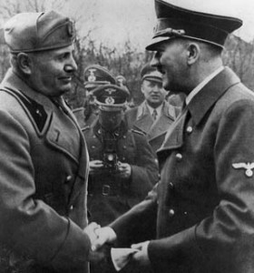 On one of his many state visits to Germany, Italian dictator Benito Mussolini greets his Nazi benefactor, Adolf Hitler.