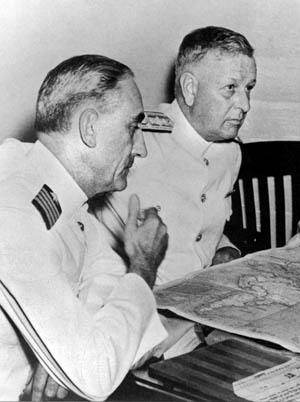 Admiral Husband E. Kimmel (right), in command of the U.S. Pacific Fleet on the “day of infamy,” shown with his operations officer, Captain Walter S. DeLany, five days before the attack.