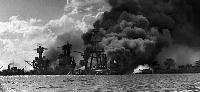 Three stricken battleships (from left): West Virginia, Tennessee, and Arizona still afire late on December 7. Only the Arizona would not live to fight another day.