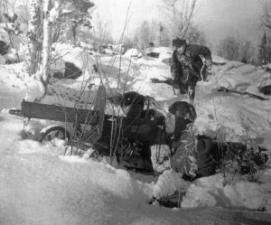 Their heavy machine guns clearly visible in the snow, Red Army soldiers support their comrades' attacks against the Germans during the winter of 1941-1942. The Soviets were willing to sustain horrendous losses to relieve the Nazi pressure on their capital.