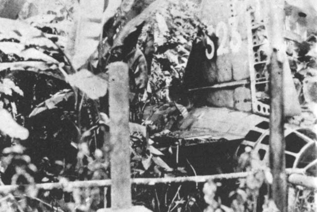 Wreckage of Yamamoto’s “Betty” lies on the jungle floor on the island of Bougainville.