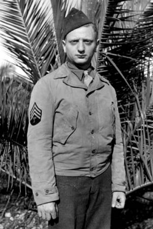 Siegmund Spiegel, 1st Infantry Division, photographed in North Africa, came to the U.S. in 1938; his parents were deported from Germany to Poland and never heard from again.