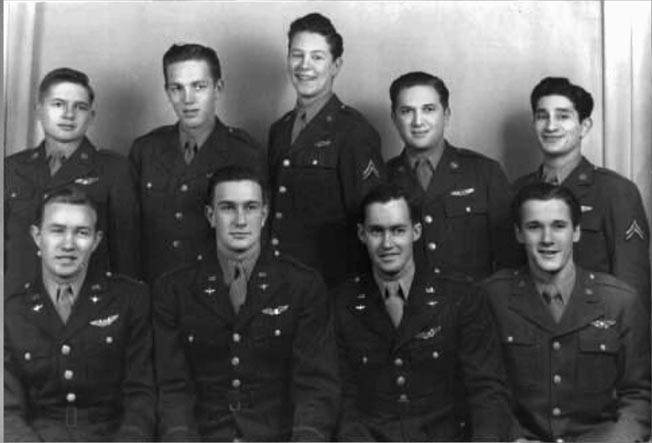 The crew that rode Skyway Chariot on its fateful day. Front Row (L to R): John Spencer, pilot Rollie King, Jack Williams, Ray Wilding. Back Row: Robert G. Mitchell, Francis Gordon, James Baker, Meyer Gitlin, Archie Mathosian.