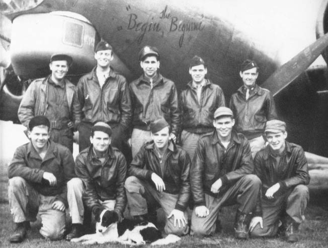 The crew of the Boeing B-17 bomber nicknamed Begin the Beguine posed for this photograph with its aircraft in the background shortly after arriving in England. Bib Bowers is kneeling second from right.