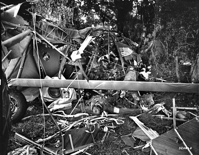 An American lies dead in the wreckage of his glider after crashing near Carentan on June 7. Members of Fallschirmjäger 6 ambushed many of the gliders as they landed.