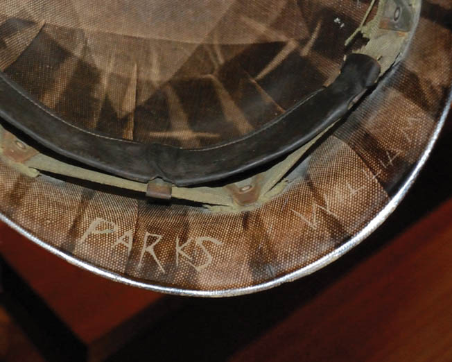 “Parks William” is visibly etched inside the helmet liner that Parks lost during the Battle of the Bulge in 1944. Parks died in 1993, but the lost artifact was eventually presented to his family.