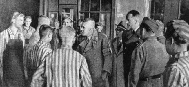 The only image of Speer (fourth from right) visiting a concentration camp (Mauthausen). Speer claimed not to know about the existence of Hitler’s “Final Solution.”