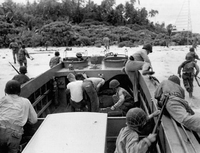 Marines of the 1st Division storm ashore at Guadalcanal on D-day, August 7, 1942, from a Landing Craft Personnel (Large)—LCP(L)—barge launched from either the attack transport Barnett and attack cargo ship Formalhaut. 