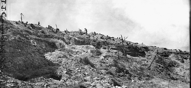 Marines ascending a slope during the Okinawa campaign. 