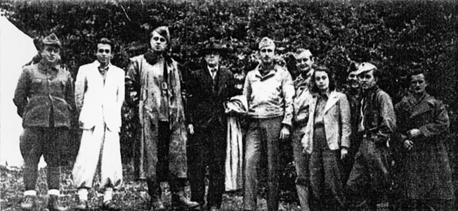 Gunnery Sergeant Nick “Cooky” Kukich, fifth from left, stands with a group of Albanian resistance fighters that includes communist leader Enver Hoxha, third from left, who became dictator of the small country for 40 years after the end of World War II.