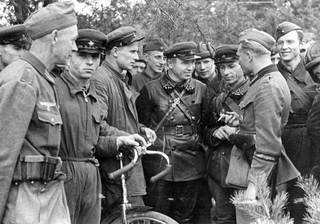 Russian troops from the 29th Tank Brigade meet up with their German counterparts in Dobuchin, Poland (now part of Belarus). Hitler and Soviet leader Josef Stalin had a secret pact to divide up Poland between them after Germany’s invasion. 